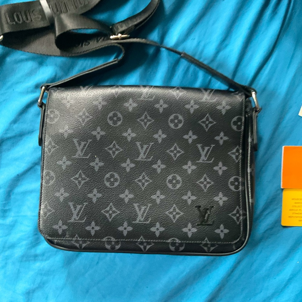 Louis Vuitton Black Messenger Bag with Monogram Design